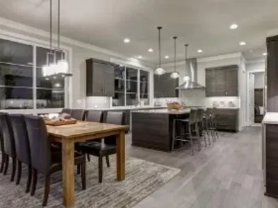 Kitchen and dining area of a luxury home with an an open floor plan