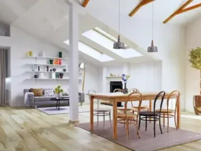Modern, open dinning/living area with wide plank flooring