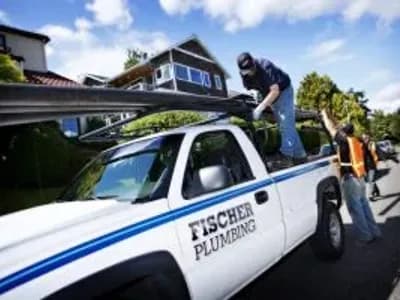 Fischer Plumbing Technicians in truck