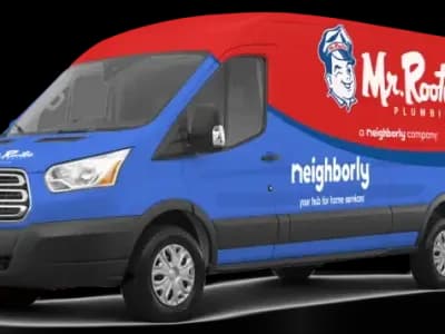 Red and blue branded Mr. Rooter and Neighborly van.