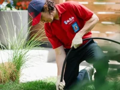 Mr. Rooter Plumbing technician arriving at a customer's home.