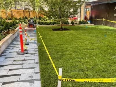 Home in Dobbs Ferry, NY with a patterned paver driveway.