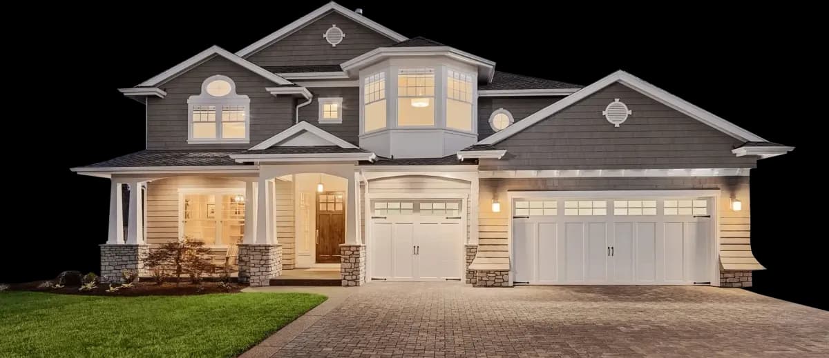 A two-story house with a garage.