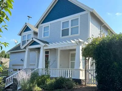 a two story house in portland painted by jk paint & contracting