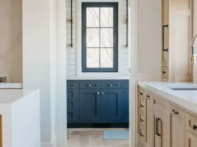 kitchen with blue cabinets by 10x builders in utah county