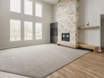 living room with light carpet and large windows by 10x builders in utah county