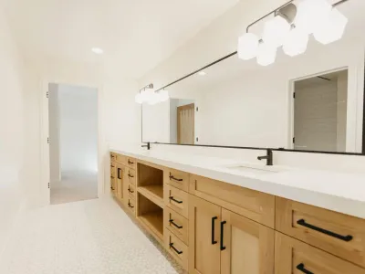 double vanity bathroom sink with wall length mirror by 10x builders in utah county
