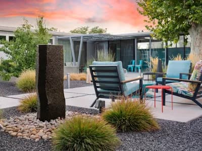 New Mexico Water Fountain Stone Forest Iron Pergola Concrete Slab Mid Century Modern Backyard Landscape Design