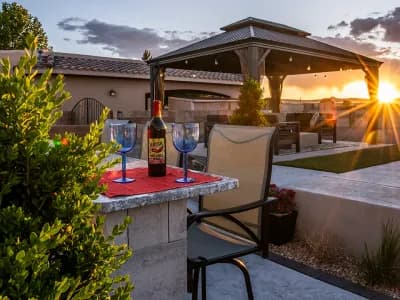 Backyard Outdoor Kitchen Granite Countertop Belgard Artforms Pergola Concrete slabs