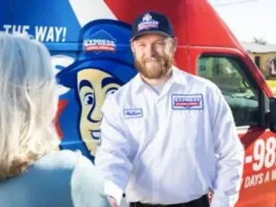 Express Electrical employee greeting a customer in Los Angeles