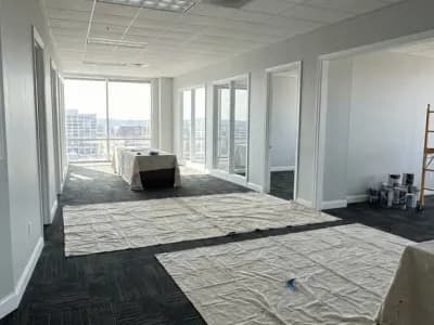 Freshly painted modern commercial office interior with light gray walls and white trim in Nashville, TN