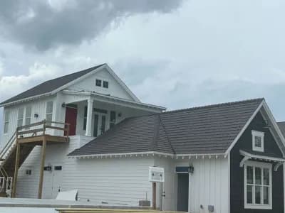 white House with a shingle roof