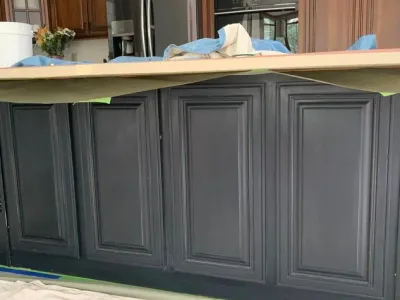 We added a nice slate black paint to this kitchen island to help it stand out.