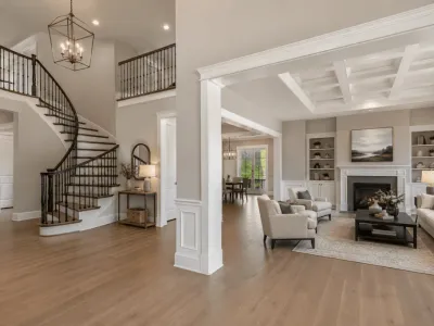 A large home interior in Charlotte with freshly painted walls, ceiling, and trim.