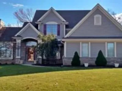 Freshly painted house exterior with vibrant colours in Waukesha, WI