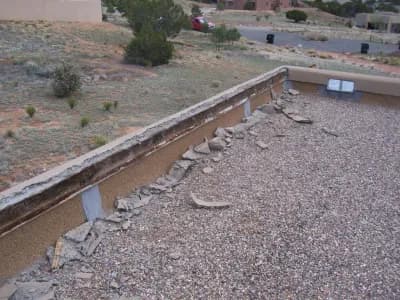 removal of loose stucco on home foundation