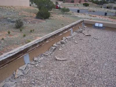removal of loose stucco on home foundation