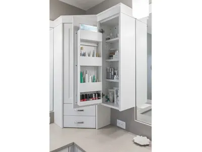 White cabinets with a tan countertop in a newly renovated bathroom