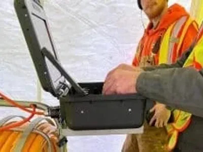 technicians with drain cleaning camera