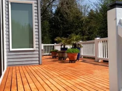 New deck with wood framing on a residential property.