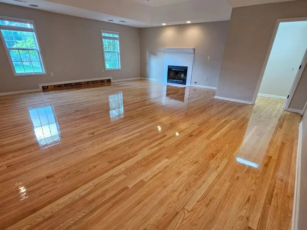 Solid red oak hardwood floor installation completed in Atlanta, GA by Mr. Hardwood Inc. featuring newly sanded, stained, and refinished natural wood floors.
