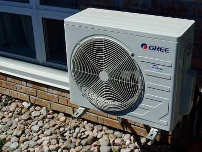 Outdoor residential air conditioner ready for spring AC service in Utah