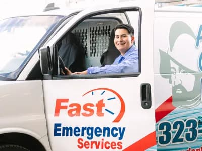Team member of Al Coronado in his work van