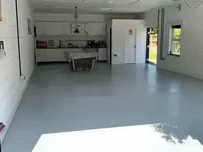 Smooth white walls and new flooring brighten a space refreshed by Paint‑Pro’s interior painting.