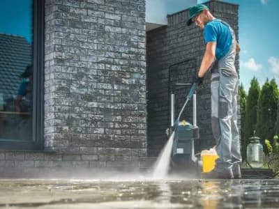 High-powered washing clears away debris from exterior surfaces handled by Paint‑Pro’s.