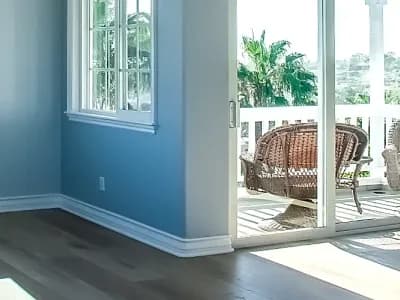 Blue walls with white trim brighten a space updated by Paint‑Pro’s.