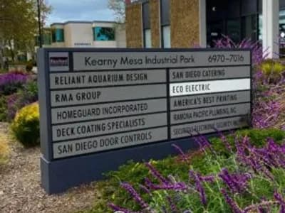 Kearny Mesa Industrial Park sign with Eco Electric San Diego highlighted