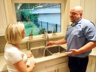 Monkey Wrench Plumber Testing a Sink Drain | Professional Drain Cleaning Services | Hydro Jet Drain Cleaning
