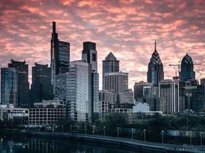 Beautiful golden sunset casting shadows over large buildings