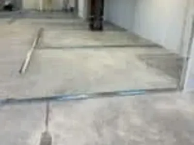 An empty workspace prepared for metal stud framing.
