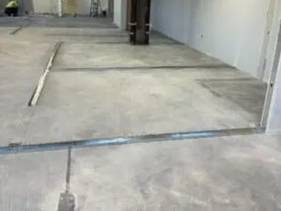 An empty workspace prepared for metal stud framing.