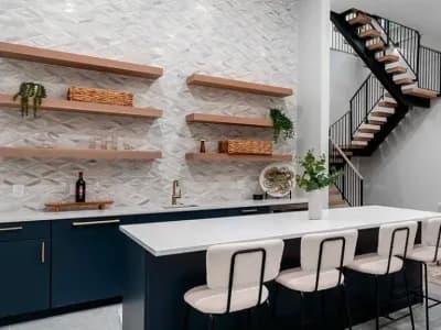 Modern Basement Bar with island and floating shelves