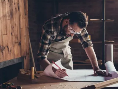 Man drawing plans