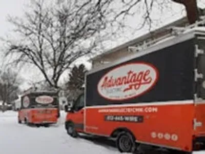 Advantage Electric van parked on street in winter