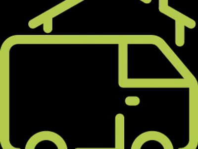 van in front of house icon