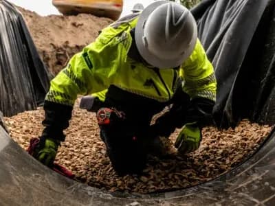 6,100 FL of storm drain; 32 drainage structures