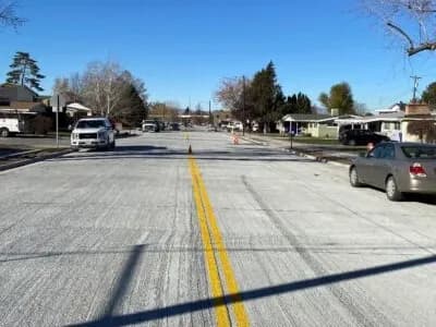 79,940 SF concrete roadway paving; 3,867 LF of curb