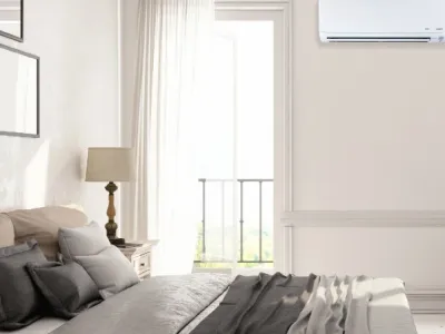 Bedroom With Ductless Mini Split On Wall