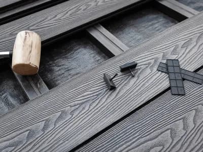 Installation services showing tools and composite decking materials in progress