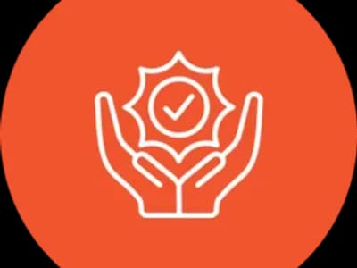 Hands holding checkmark symbol on orange background.